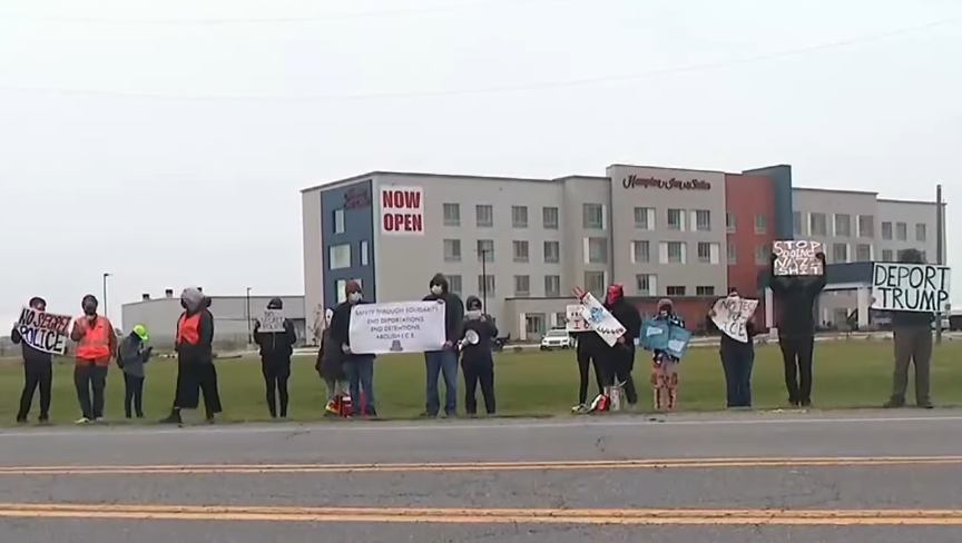 Activists Brave Rain to Protest ICE Operations at Little Rock DHS Office
